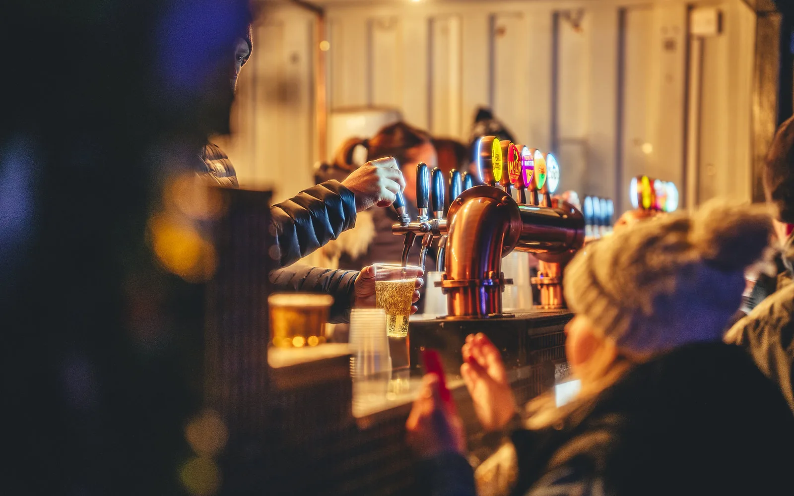Festival food stalls and bars lit up at the event